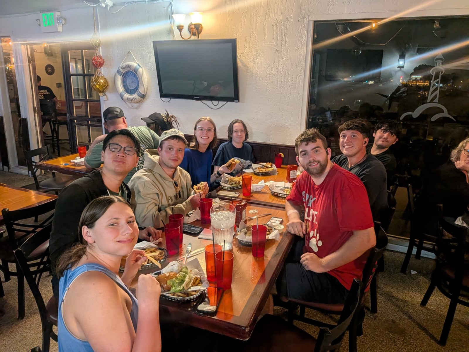 Our group gathered around a table for dinner during the trip